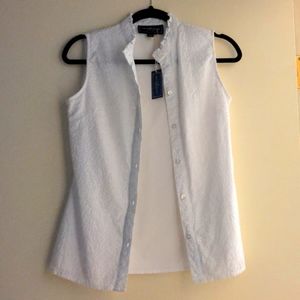 KJP white eyelet sleeveless button down blouse.